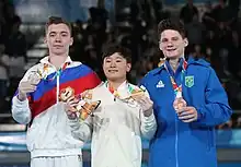 All-around victory ceremony (from left to right): Sergei Naidin (Silver), Takeru Kitazono (Gold), Diogo Soares (Bronze)