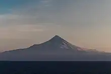 Shishaldin (9,373 ft; 2,857 m) volcano as seen from the Unimak Pass in the morning light.