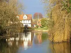 Backwater of the Thames at Sonning Eye, with a view of the French Horn at Sonning.