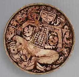 Bowl depicting King Zahhak with snakes protruding from his shoulders, 12th–13th century, with alterations first half 20th century. Attributed to Northwestern Iran, Garrus District. Metropolitan Museum of Art.