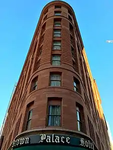Standing on the flatiron shaped corner of The Brown Palace, looking up it is easy to see how dramatically angled the building is.