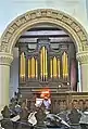 Christ Church, Welshpool. Terracotta arch with organ by Gray of 1815