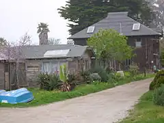 Cottages and barn from East Cliff Dr