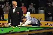 Mark Selby playing a shot