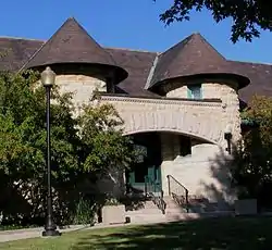 Entrance to the George C. Walker Library. The building and many of the books the library contained when it opened were a gift of George C. Walker, then president of the Blue Island Land and Building Company (his predecessor being F.H. Winston, a prominent Chicago attorney). The original portion of the building was designed by Charles Sumner Frost and cost $12,000. It opened on April 22nd, 1890, was expanded by an addition that quadrupled its space in 1929, and received a major renovation in 1995.