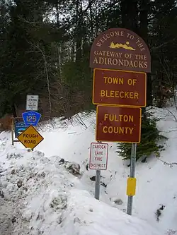 Signage along County Route&nbsp;125 entering the town of Bleecker and Fulton County