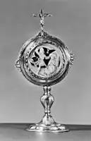 Mother of pearl medallion, after a print by Master E.S., c. 1480, mounted in silver as a pax in 17th century