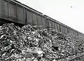 Train unloads its garbage (1954)