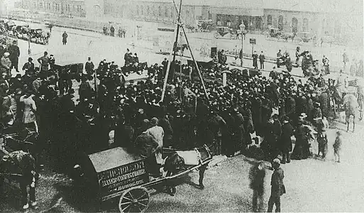 The crowd at the laying of the foundation stone, 1887. The A-frame supported the pulley which lowered the stone.