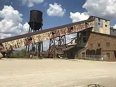 One of the large buildings next to the museum.