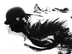 46:08 dead German soldier, snow on back