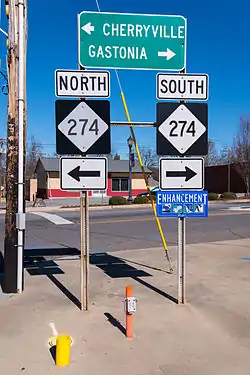 Directional signs of NC&nbsp;274, at the end of NC&nbsp;161, in Bessemer&nbsp;City