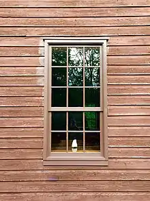 Nine-over-six double-hung sash wooden window