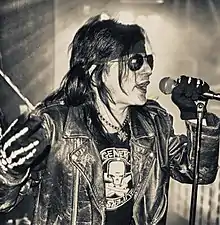 Lewis performing with L.A. Guns in 2010