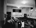 Women's meeting room, prior to relocation. Note the ministers' gallery and elders' bench (far right).