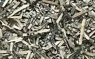 Shreds of unfit US dollar notes with a typical size of less than 1.5 mm × 16 mm