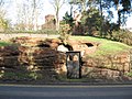 The sign next to the entrance says "Wolverley Pound, formerly used for impounding animals found straying until ransomed by their owners".