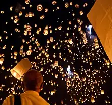 Sky lanterns in the sky on the night of Yi Peng in Thailand.
