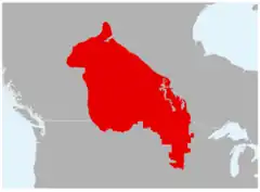 Em vermelho, sua área de distribuição