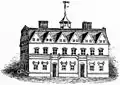 O primeiro Harvard Hall, Universidade de Harvard, creditado como o mais antigo exemplo conhecido de um telhado de gambrel na América do Norte, construído c. 1677, queimado 1766