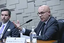 Mesa da Audiência Pública sobre a dívida no balanço das Lojas Americanas.  CEO das Americanas, Leonardo Coelho Pereira com o ex-CEO das Americanas, Sérgio Agapito Lires Rial - em pronunciamento.