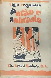 Capa do livro de contos "Porão e Sobrado", em que se vê um menino com um cachorro no colo.