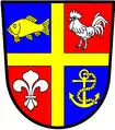cruz filete—Quartel, azure e gules; 1. um peixe nadando horizontalmente or; 2. um galo argento; 3. uma flor-de-lis argento; 4, uma âncora suja or; tudo sobre uma cruz filete or—Município de Port Alfred, RSA