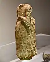 Estátua sem cabeça de um homem sumério, de Cafaja, início do período dinástico (2900–2350&nbsp;a.C.) Museu de Suleimânia