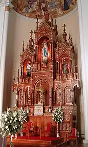 Estácio Zambelli: estatuária no altar-mor da Igreja de Nossa Senhora de Lourdes, Caxis do Sul.