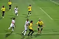 Jogo de Futebol do Kashiwa Reysol (Amarelo) vs. FC Tokyo (Branco)