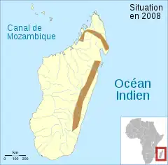 Sua distribuição está compreendida na área em marrom.