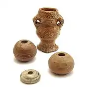 Três fusaiolas da Idade Média