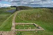 Os restos de Castle Nick, Milecastle 39, perto de Steel Rigg, entre Housesteads e o Once Brewed (Visitor Centre for the Northumberland National Park).