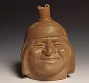 Vaso-retrato sorridente mochica.