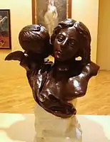 O segredo, cerca de 1907, em bronze e mármore