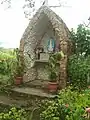 Um oratório dedicado a Nossa Senhora das Graças na zona rural da cidade.