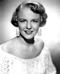 Imagem em preto e branco de Peggy Lee.