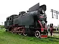 Locomotiva a vapor TKt48 na estação ferroviária de Knyszyn