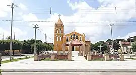 Praça da Matriz de Frutuoso GomesAo fundo a Capela de Nossa Senhora do Perpétuo Socorro