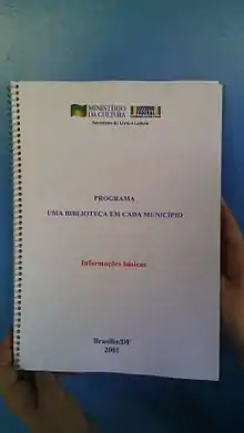 Cartilha de informações básicas do Programa Uma biblioteca em cada município, de responsabilidade do Sistema Nacional de Bibliotecas Públicas.