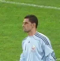 Coman com a camisa da Romênia, na partida contra a Áustria.