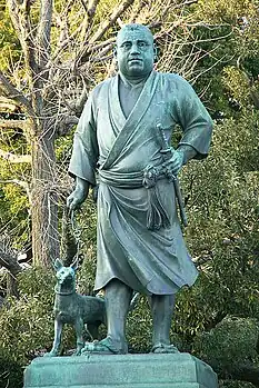 Estátua de Saigō Takamori andando com seu cachorro