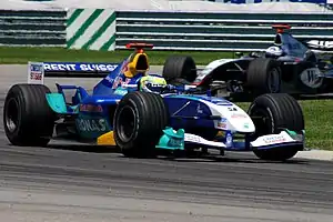 Giancarlo Fisichella pilotando a Sauber C23 no Grande Prêmio dos Estados Unidos de 2004.