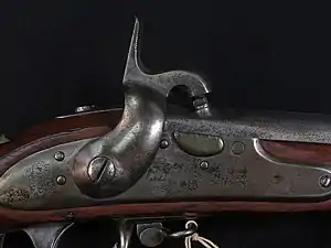 Close do mecanismo de ação do Springfield Model 1822 convertido para percussãoClose do mecanismo de ação do Springfield Model 1822 convertido para percussão.