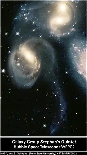 Pelo Telescópio Espacial Spitzer