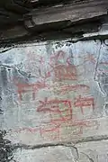Alce, rena, urso e figuras humanasRuvallen (Härjedalen)