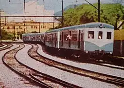 Um TUE Série 100 reformado, próximo a estação de Magno (Atual Mercadão de Madureira).