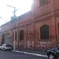 Fachada da tecelagem atualmente grafitado