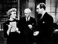 Eve Arden, Harry Davenport e Melvyn Douglas em cena do filme