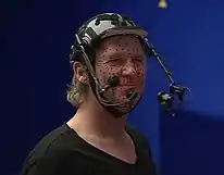 Jeff Bridges preparando-se para fazer uma cena como CLU.